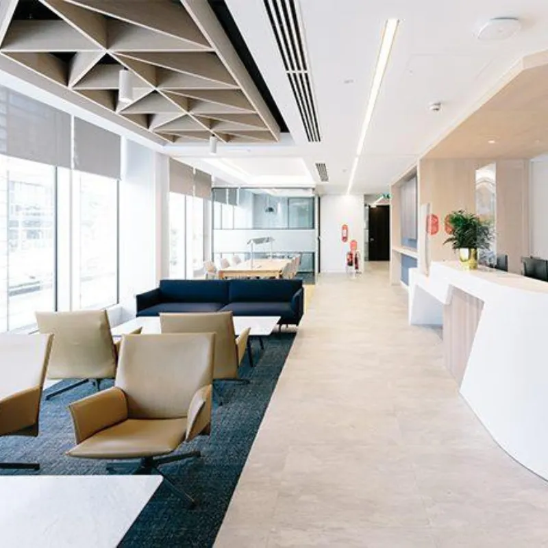 Linear ceiling diffuser above the reception seating area at Zurich Enterprise House